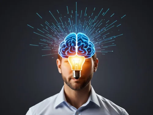 Close-up of a man's head with his brain visualized above a lightbulb, sparks scattering around it.