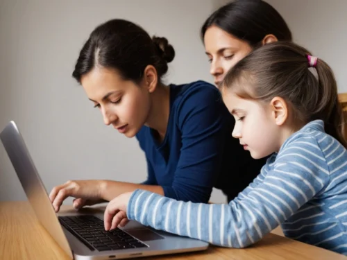 Mother teaching her two young daughters how to use screens mindfully