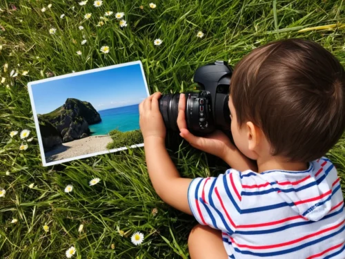 Young boy handling camera while exploring in natural outdoor setting