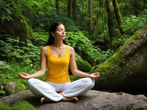 Woman sitting in meditation beneath a large, ancient tree in a dense forest, surrounded by tall trees and dappled sunlight filtering through the canopy